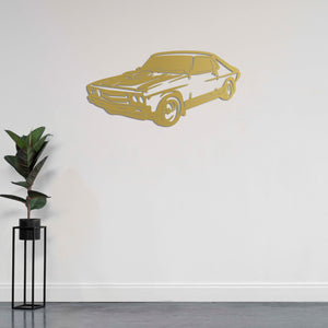 Decorative metal sculpture featuring iconic American vintage car