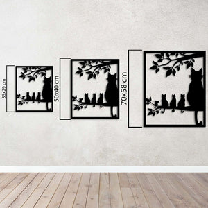 Decorative metal wall art featuring elegant cat silhouettes