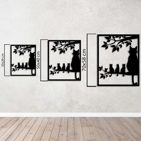 Decorative metal wall art featuring elegant cat silhouettes