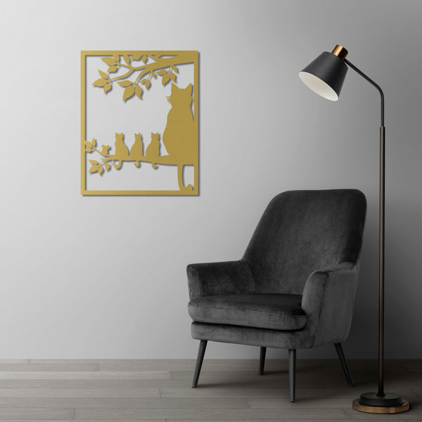 Handcrafted decorative metal sculpture with playful cats